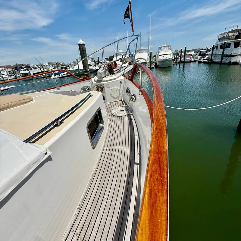 Slide: The Image of Grand Banks 52 Europa yacht docked in marina, 1999 model. - 32