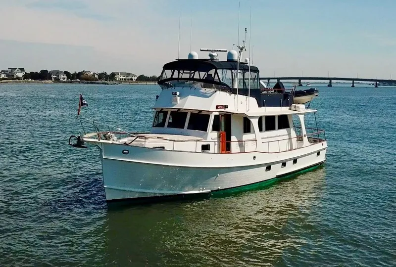 Slide: The Image of 1999 Grand Banks 52 Europa yacht on the water. - 39