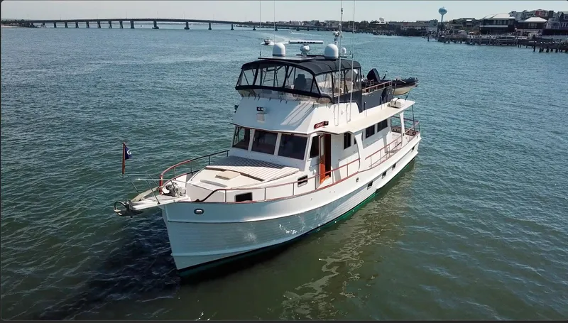 Slide: The Image of 1999 Grand Banks 52 Europa yacht on the water. - 4