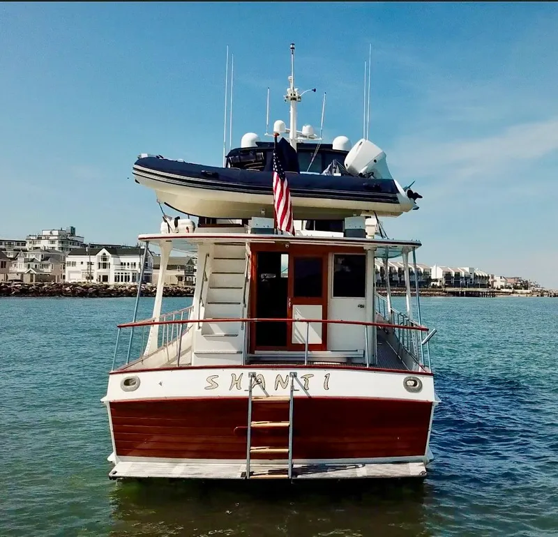 Slide: The Image of 1999 Grand Banks 52 Europa yacht on the water. - 7