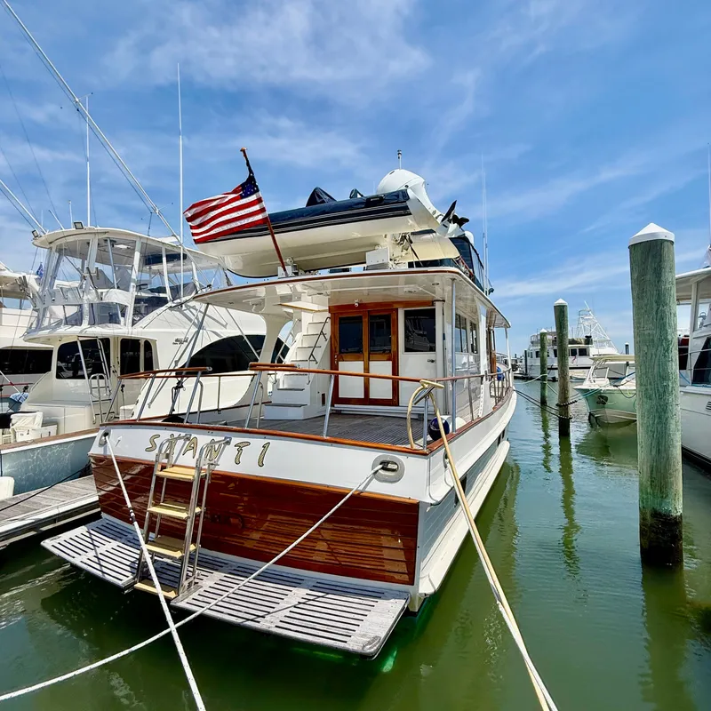 Slide: The Image of 1999 Grand Banks 52 Europa yacht docked at marina. - 8
