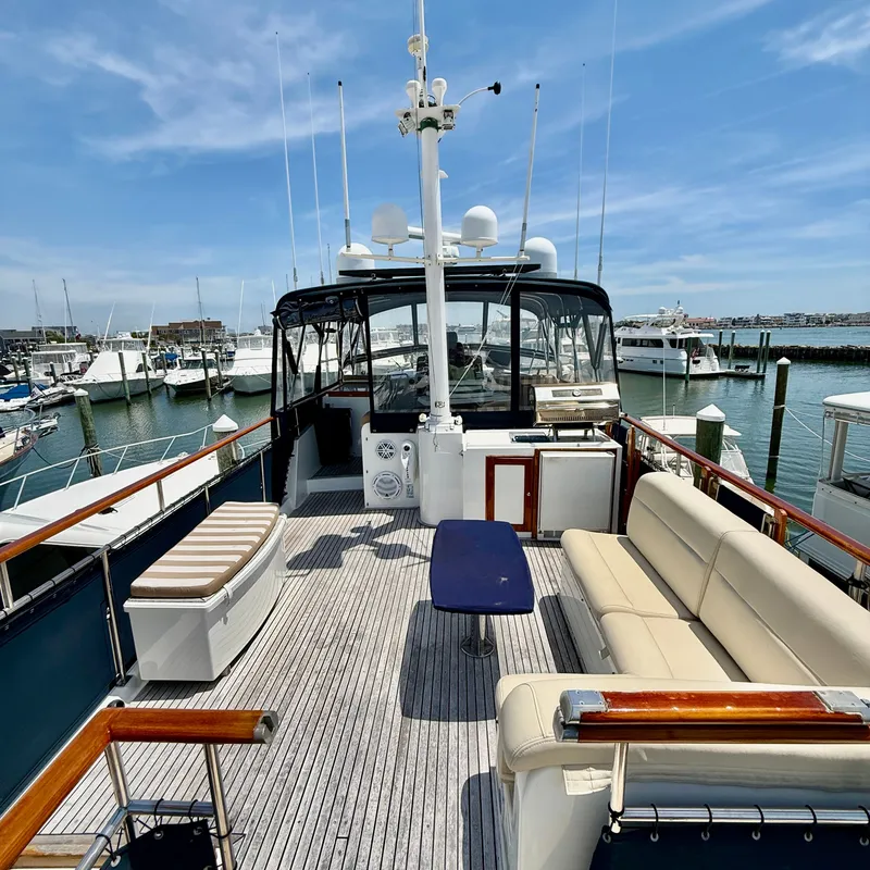 Slide: The Image of 1999 Grand Banks 52 Europa yacht docked in marina. - 9