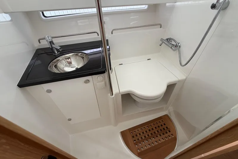 Slide: The Image of Modern bathroom in 2025 Nimbus Tender 11 yacht with sink, toilet, and shower. - 41