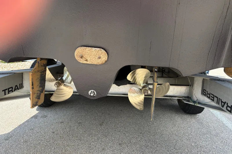 Slide: The Image of Propellers of a 2003 Sea Ray Sundancer 320 on a trailer. - 37