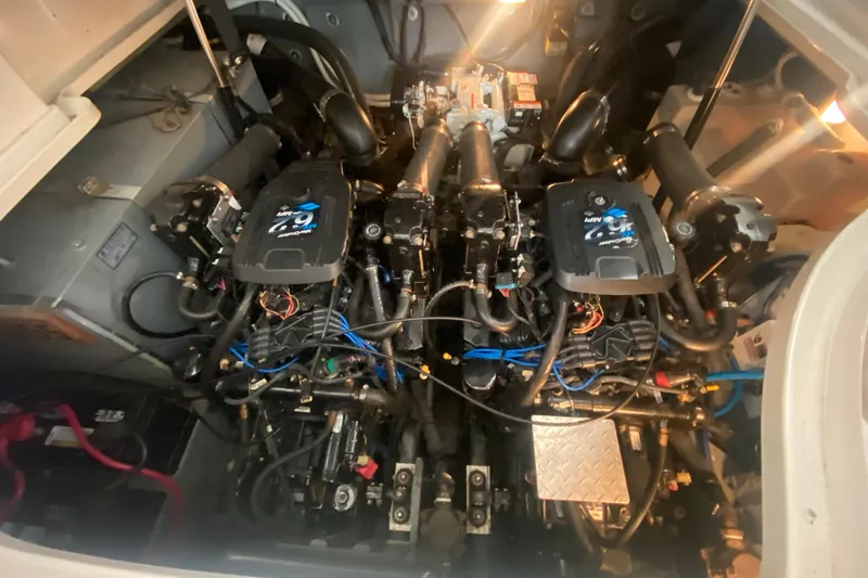 Slide: The Image of Engine compartment of a 2003 Sea Ray Sundancer 320 with twin MerCruiser engines. - 21