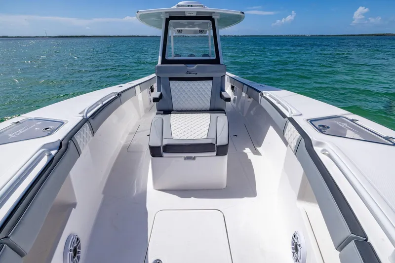 Slide: The Image of 2025 Streamline R 35 boat interior with luxurious seating on open water. - 17