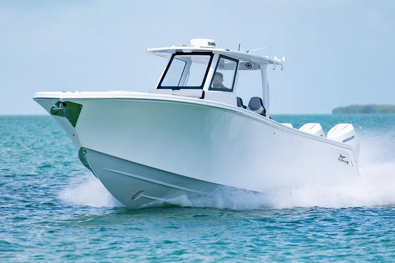 Slide: The Image of 2025 Streamline R 35 boat cruising on open water, showcasing sleek design and powerful performance. - 6
