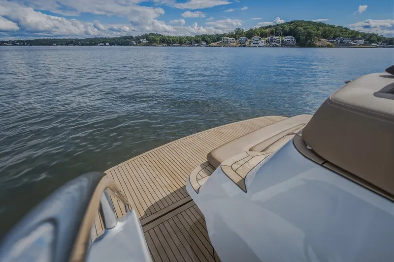 Slide: The Image of Luxury yacht Steeler Bronson 50, 2022 model, cruising on a serene lake with scenic views. - 35