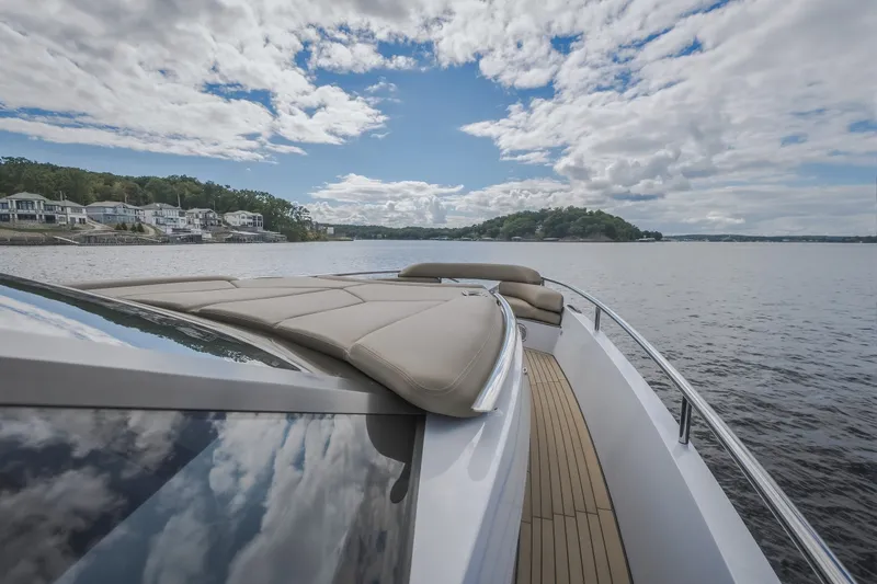 Slide: The Image of Steeler Bronson 50 yacht cruising on a scenic lake, 2022 model. - 54