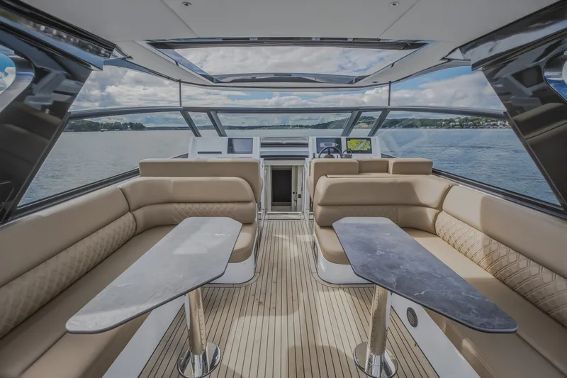 Slide: The Image of Luxurious interior of 2022 Steeler Bronson 50 yacht with elegant seating and tables. - 33