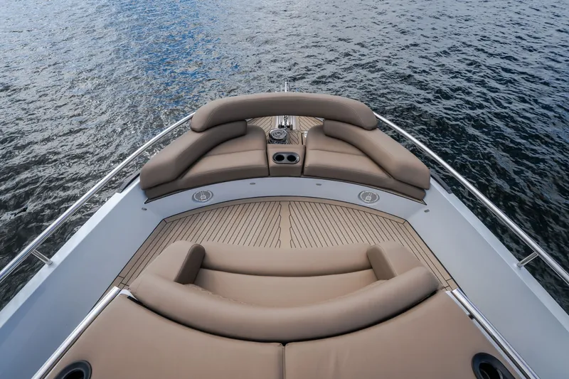Slide: The Image of Luxurious 2022 Steeler Bronson 50 yacht deck with plush seating and ocean view. - 57