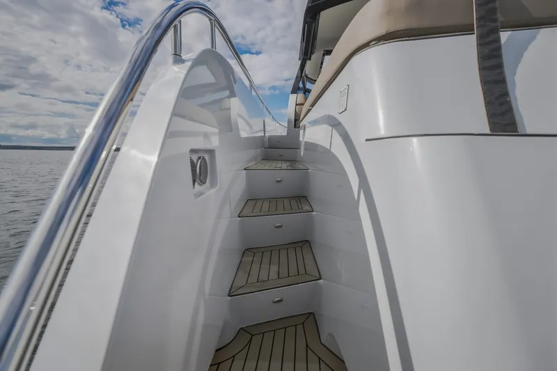 Slide: The Image of Staircase on 2022 Steeler Bronson 50 yacht with sleek design and ocean view. - 38
