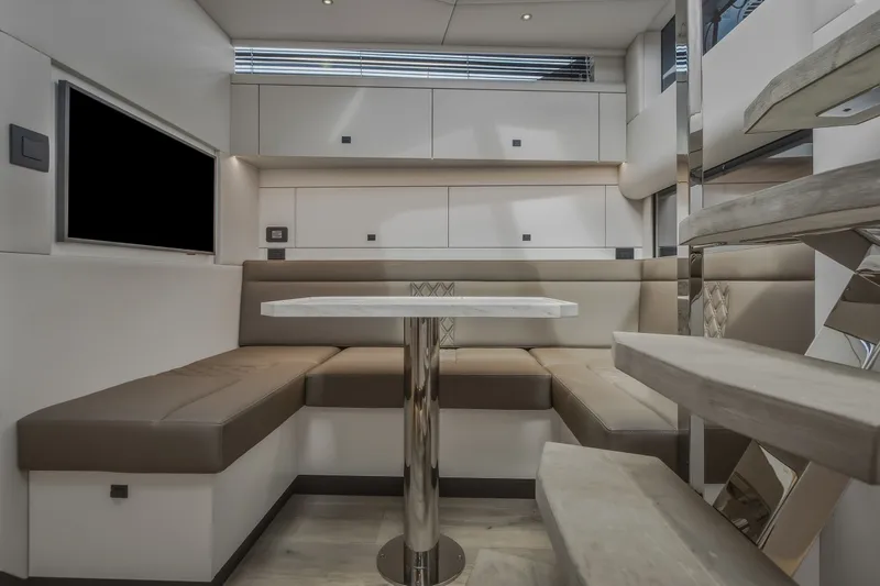 Slide: The Image of Luxurious interior of 2022 Steeler Bronson 50 yacht with modern seating and elegant staircase. - 70