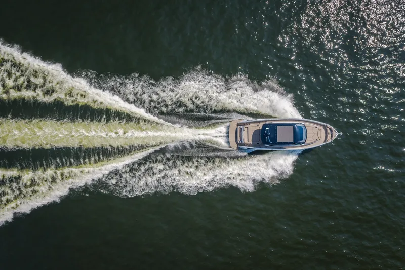 Slide: The Image of Aerial view of 2022 Steeler Bronson 50 yacht cruising on open water. - 2