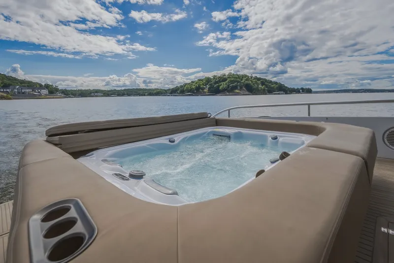 Slide: The Image of Luxurious hot tub on Steeler Bronson 50 yacht, 2022, with scenic water view. - 29