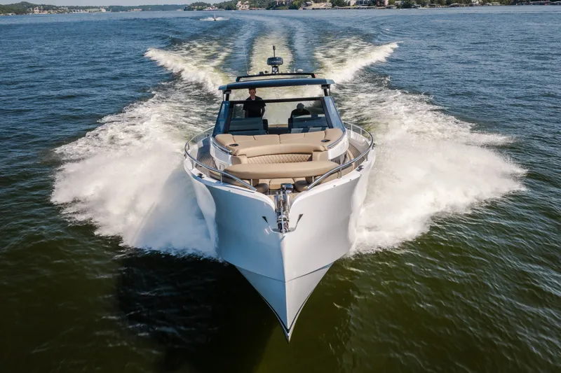 Slide: The Image of 2022 Steeler Bronson 50 yacht cruising on open water, showcasing sleek design and powerful performance. - 4