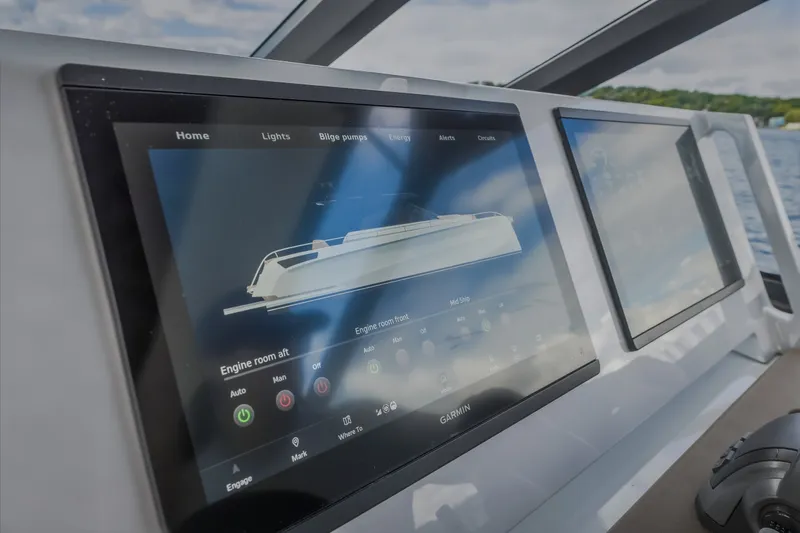 Slide: The Image of Control panel of 2022 Steeler Bronson 50 yacht with digital display screens. - 63