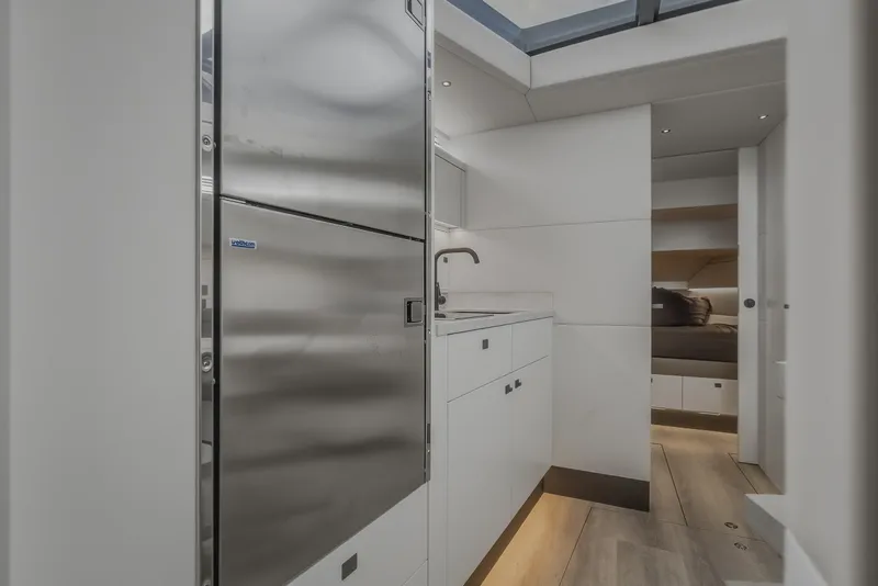Slide: The Image of Modern kitchen interior of 2022 Steeler Bronson 50 yacht with sleek stainless steel appliances. - 69