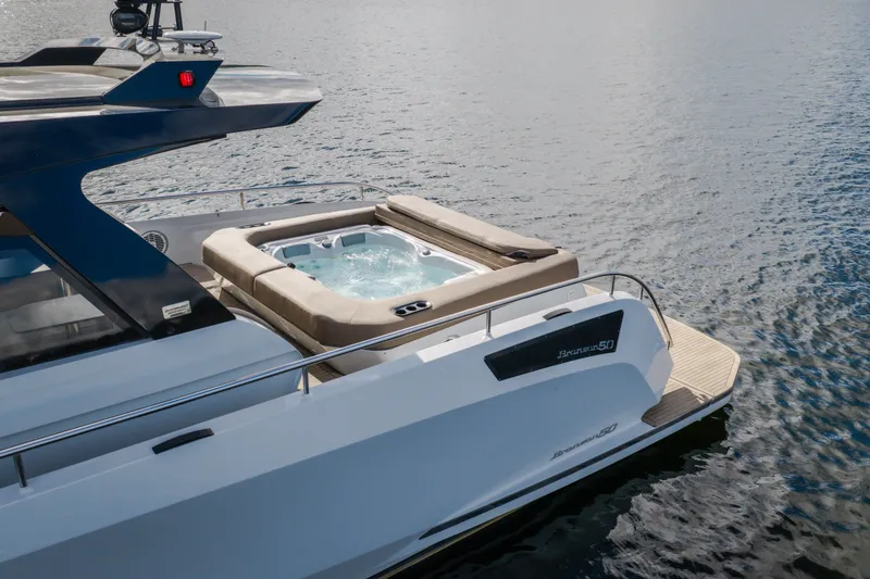 Slide: The Image of 2022 Steeler Bronson 50 yacht with jacuzzi on calm water. - 3