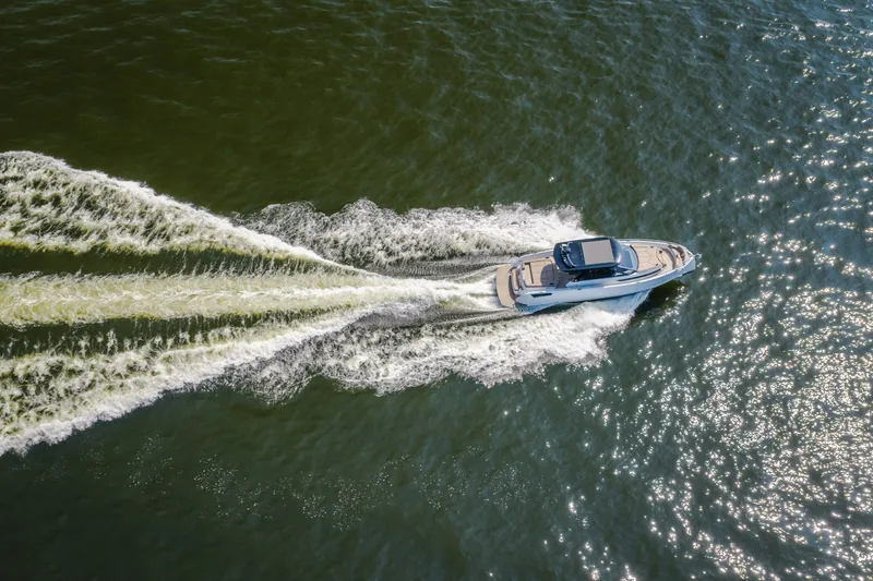 Slide: The Image of Aerial view of 2022 Steeler Bronson 50 yacht cruising on open water. - 1