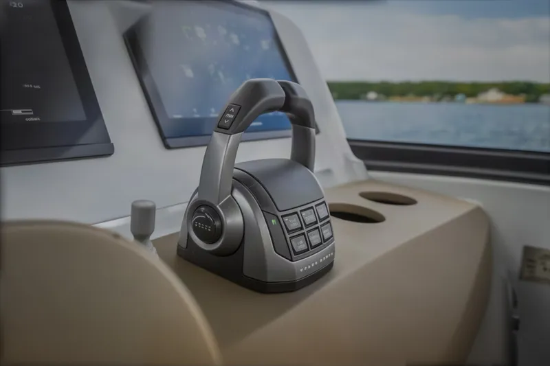 Slide: The Image of Control panel of 2022 Steeler Bronson 50 yacht with dual screens and throttle lever. - 62
