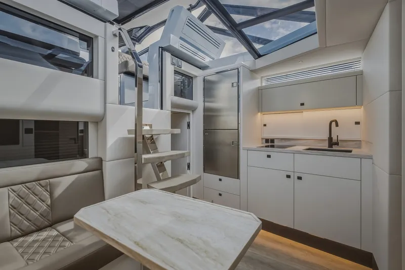 Slide: The Image of Luxurious interior of 2022 Steeler Bronson 50 yacht with modern kitchen and seating area. - 72