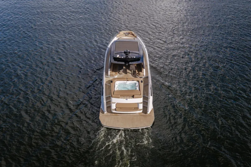 Slide: The Image of Aerial view of 2022 Steeler Bronson 50 yacht cruising on open water. - 12