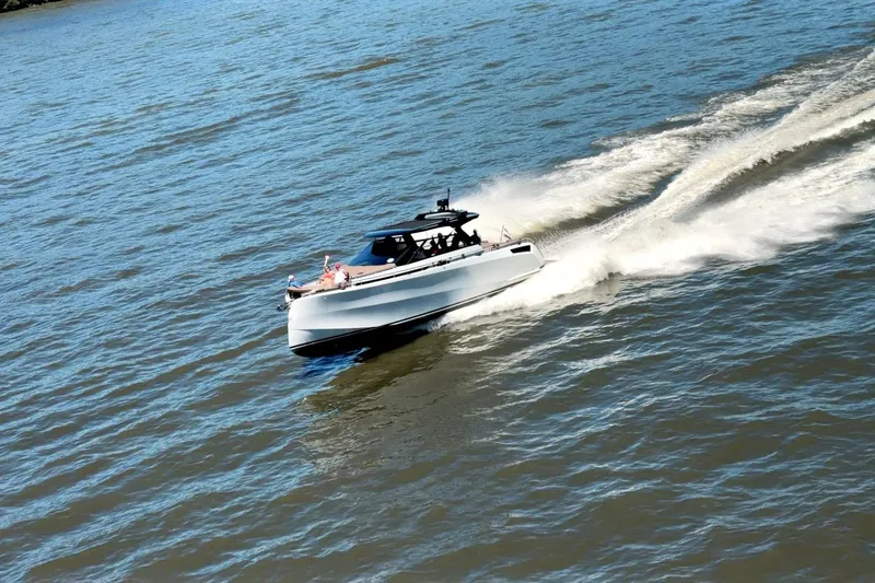 Slide: The Image of 2022 Steeler Bronzon 50 yacht cruising swiftly on open water. - 2