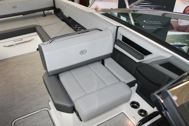 Slide: The Image of 2023 Cobalt R8 boat interior with sleek gray seating and modern design elements. - 18