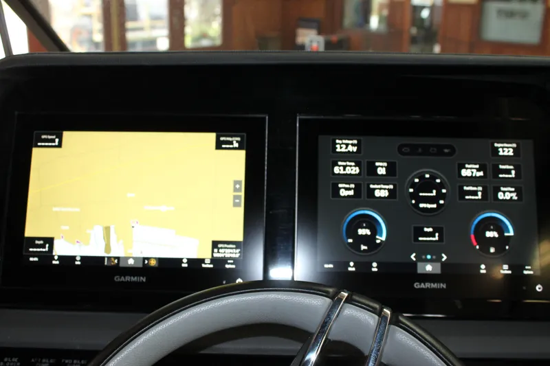 Slide: The Image of Dashboard of 2023 Cobalt R8 featuring dual Garmin displays with navigation and system information. - 22