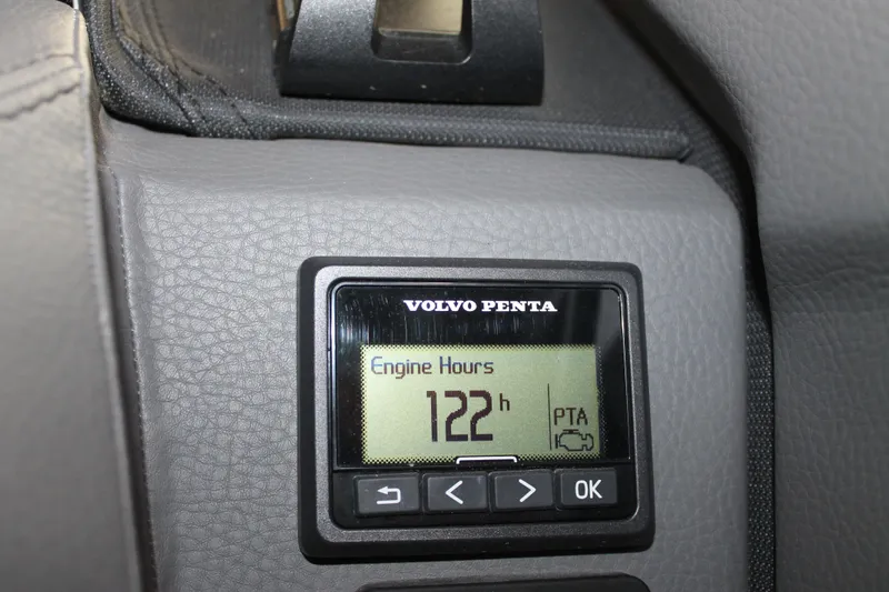 Slide: The Image of Volvo Penta engine hour meter displaying 122 hours in a 2023 Cobalt R8. - 26