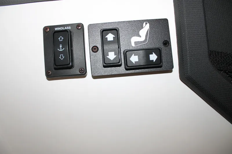 Slide: The Image of Control panel of 2023 Cobalt R8 with windlass and seat adjustment buttons. - 27