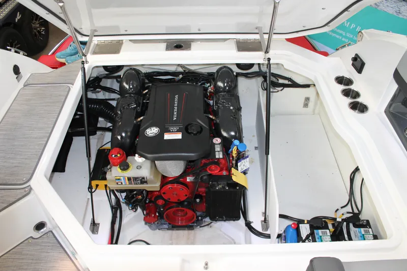 Slide: The Image of Engine compartment of 2023 Cobalt R8 boat featuring a Volvo Penta engine. - 32