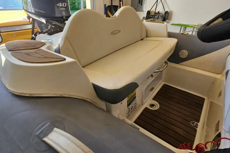 Slide: The Image of 2014 Zodiac Yachtline 2 Deluxe 380 interior with seating and Yamaha 40 engine. - 11