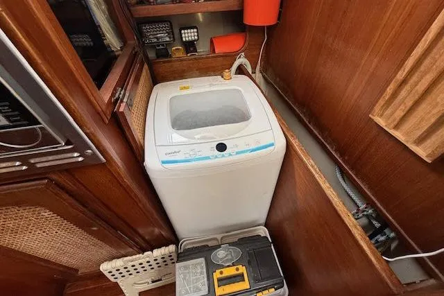 Slide: The Image of Compact washing machine in the cabin of a 1982 Lancer 45 Motorsailer yacht. - 11