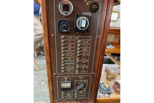 Slide: The Image of Electrical control panel on a 1982 Lancer 45 Motorsailer, featuring switches and gauges. - 13