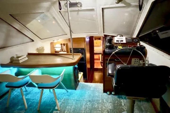 Slide: The Image of Interior of 1982 Lancer 45 Motorsailer with modern seating and navigation equipment. - 2