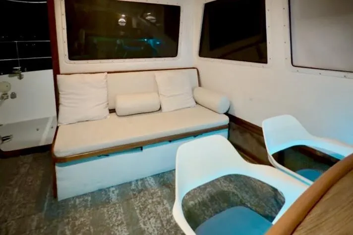 Slide: The Image of Interior of 1982 Lancer 45 Motorsailer with sofa and modern chairs. - 3