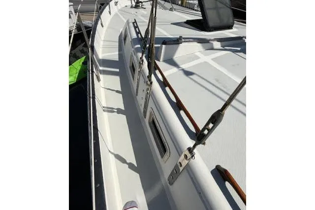 Slide: The Image of 1982 Lancer 45 Motorsailer deck view with rigging and windows. - 33