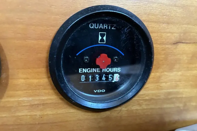 Slide: The Image of Engine hour meter reading 1345.4 hours on a 1998 Sabre 36 yacht. - 16