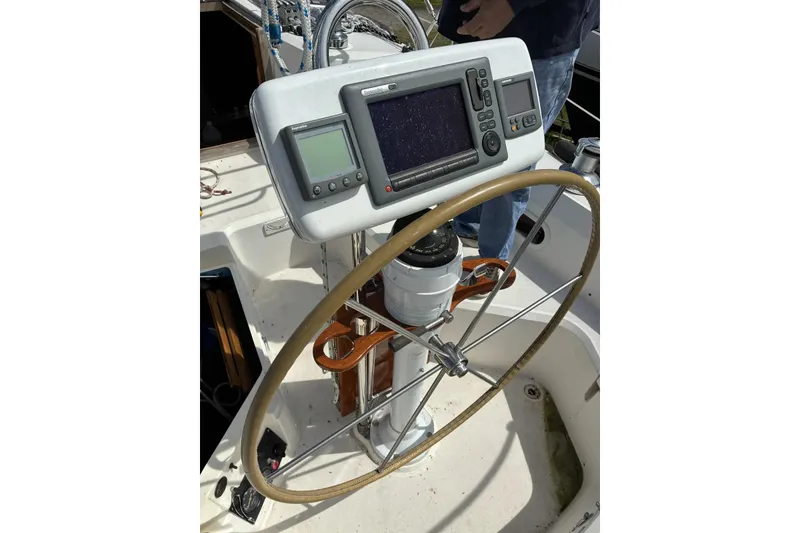 Slide: The Image of Steering wheel and navigation equipment on a 1998 Sabre 36 sailboat. - 9