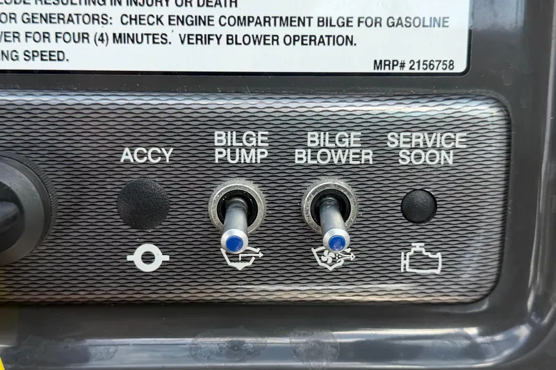 Slide: The Image of Control panel of a 2015 Sea Ray 19 SPX boat. - 23