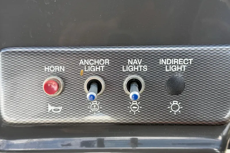 Slide: The Image of Control panel of a 2015 Sea Ray 19 SPX boat. - 24