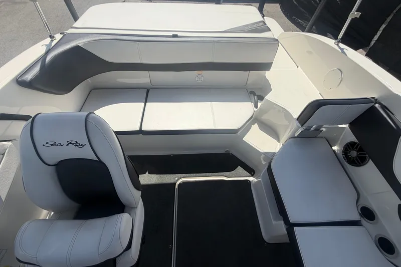 Slide: The Image of Interior of a 2015 Sea Ray 19 SPX boat with white seating and black accents. - 45