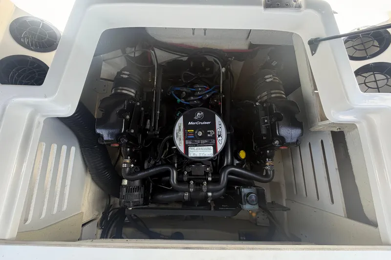 Slide: The Image of Engine compartment of a 2015 Sea Ray 19 SPX boat, featuring a MerCruiser 4.3L engine. - 50