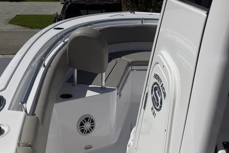 Slide: The Image of 2024 Sportsman Heritage 231 Center Console boat interior with seating and console details. - 6