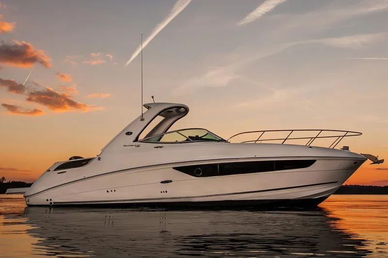 The Image of Manufacturer Provided Image: 2016 Sea Ray 310 Sundancer yacht at sunset on calm water. - 0