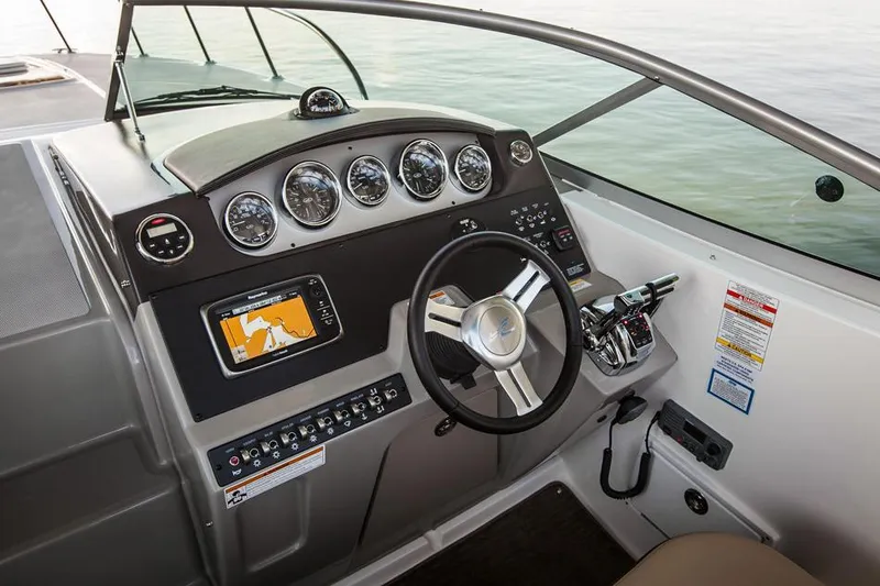 Slide: The Image of Manufacturer Provided Image: 2016 Sea Ray 310 Sundancer helm with navigation system and controls. - 4