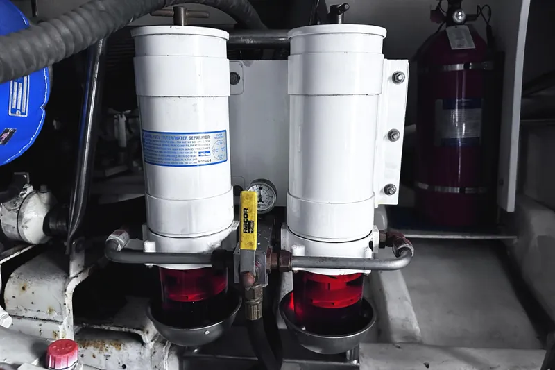 Slide: The Image of Engine room of 2004 McKinna 57 PHMY yacht with fuel filter system. - 117