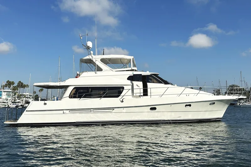 Slide: The Image of 2004 McKinna 57 PHMY Widebody yacht with stabilization on calm water. - 3